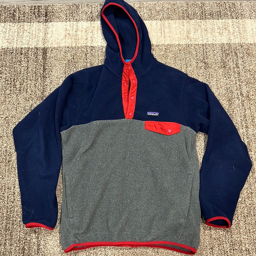 Men’s Patagonia. Grey on bottom, navy blue on top with red trim. Medium.